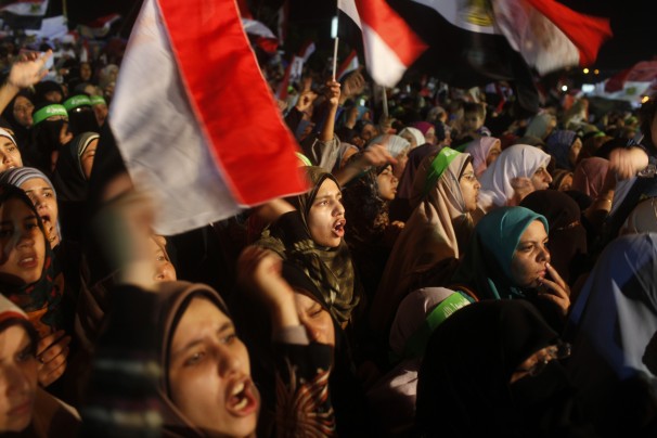 Egyptian people protest in the recent ongoing turmoil.