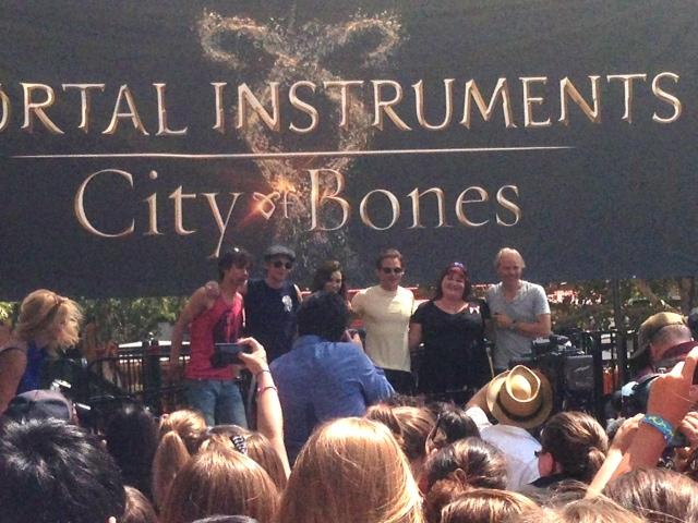 From left to right: Robert Sheehan, Jamie Campbell Bower, Lilly Collins, Kevin Zegers, Cassandra Clare, and Harald Zwart
