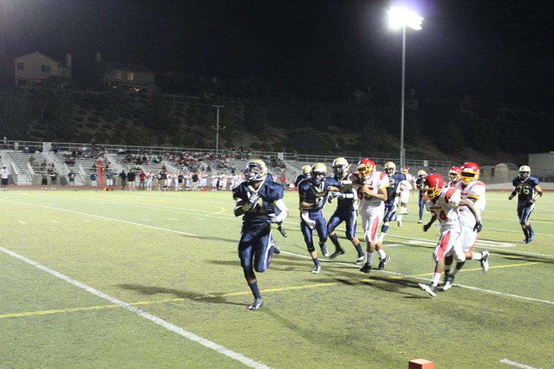 Senior running back Christian Parrish drives into the endzone. 