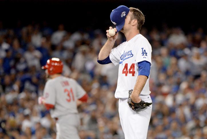 Dodger pitcher Chris Withrow is disappointed after giving away a home run.