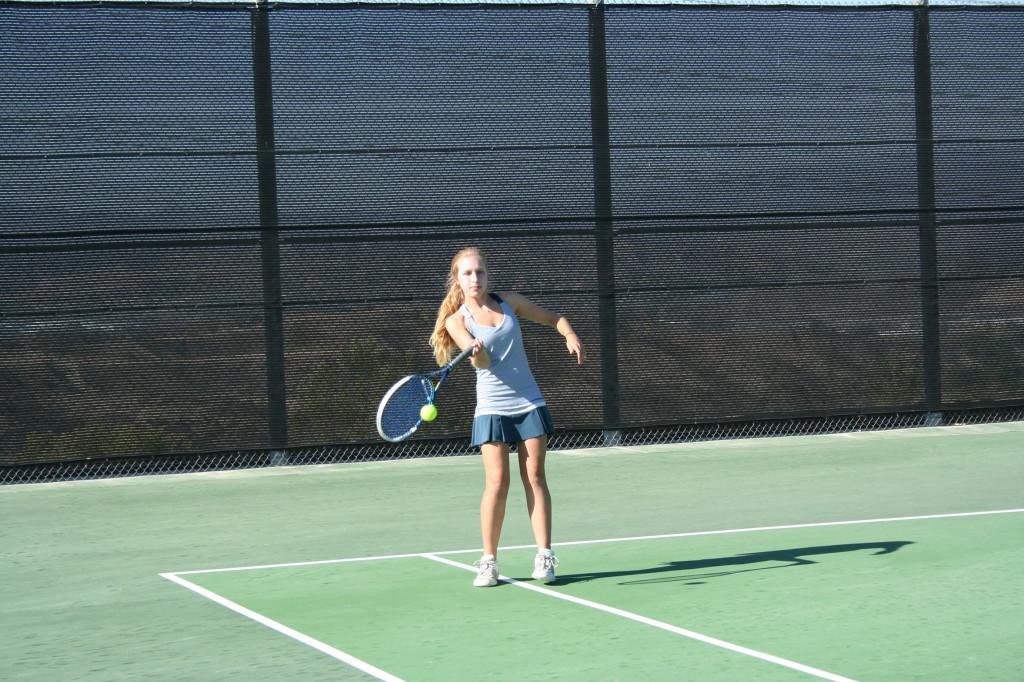Hannah Yuster returns the ball to her opponent.