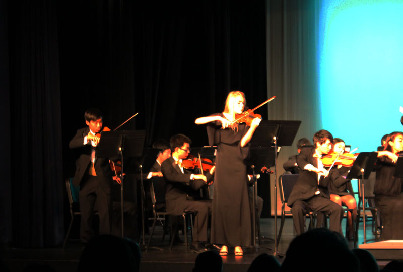 Concert-master Lauren Tandy and Christian Chung during their solos.