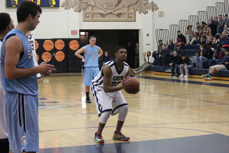 Freshman Milan Taylor attempts a free throw.