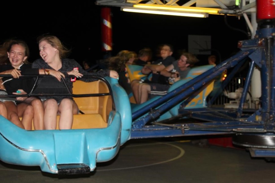 Students enjoy riding on the Sizzler at the Hunger Games Homecoming Dance.