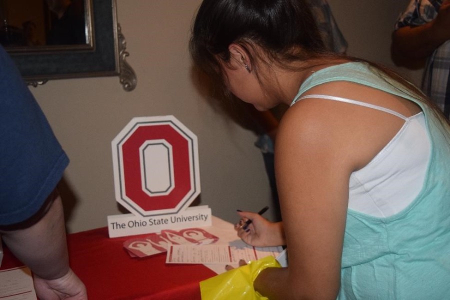 Students show interest in the various booths available at the fair.