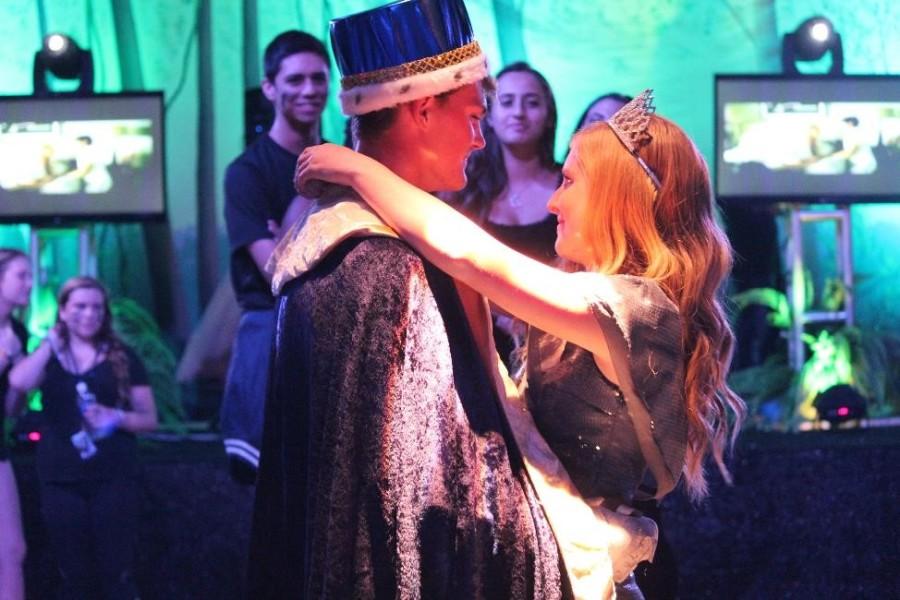 Homecoming king and queen, Jacob Shalkevich and Stephanie Rankin, share a dance at the Hunger Games Homecoming Dance.