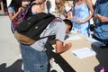 Freshman Jaryn Santos submits his vote.