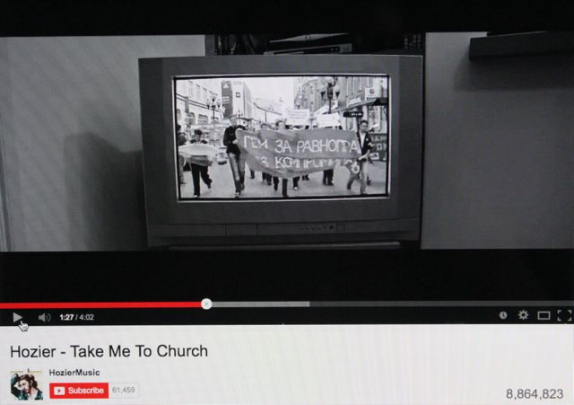 A clip of Russian protesters in Hoziers music video for Take Me To Church.