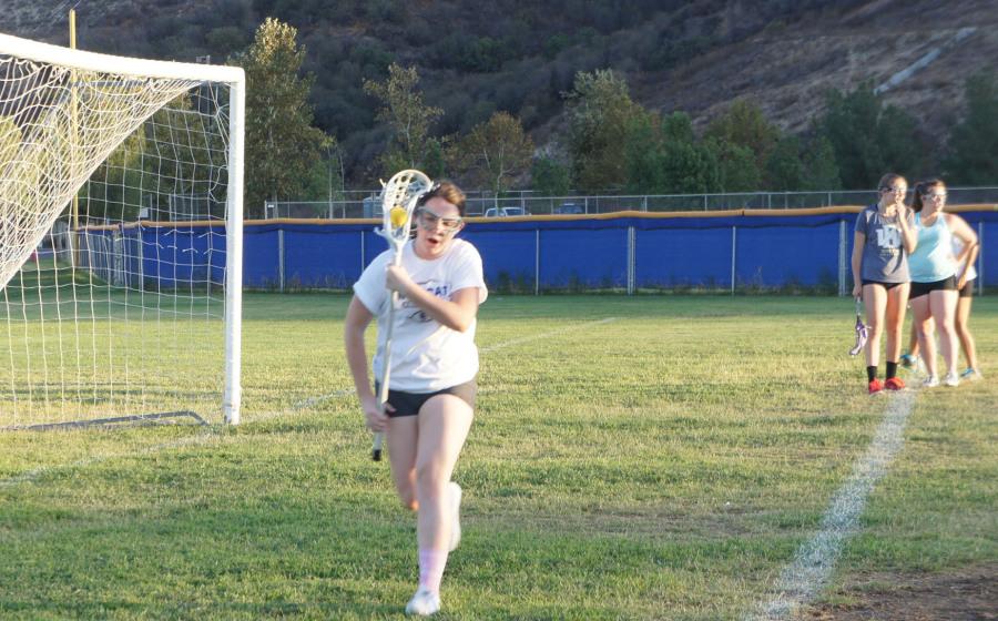  Junior Katie Flynn undergoes rigorous lacrosse exercises to prepare for the team's spring season