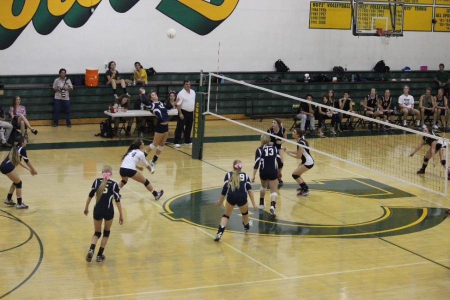 Girls varsity volleyball play it out with Canyon.