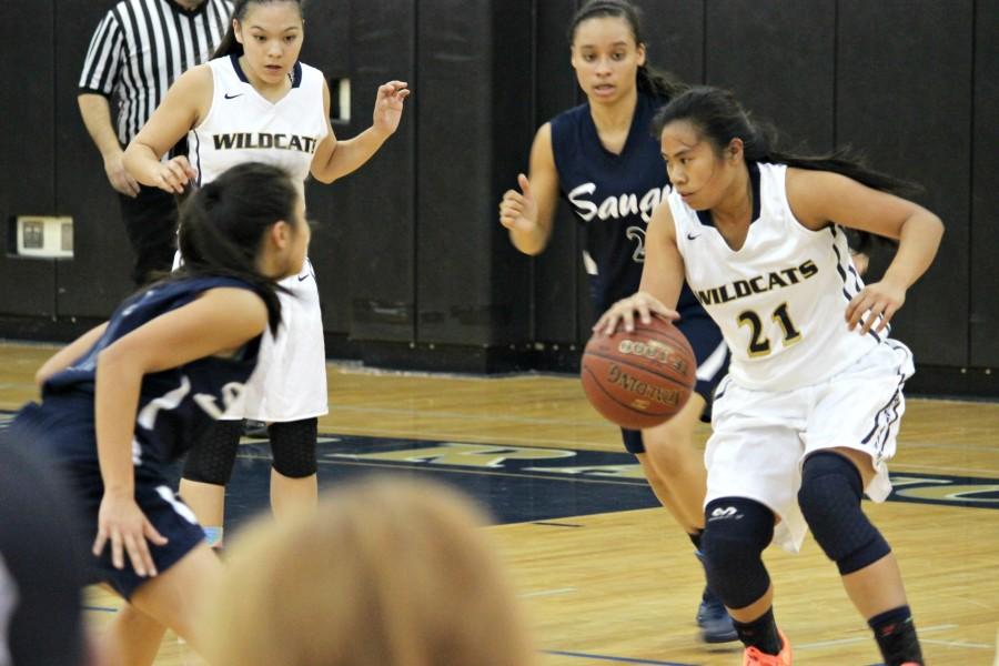 Senior Karen Du tries to get past Saugus' defender. 