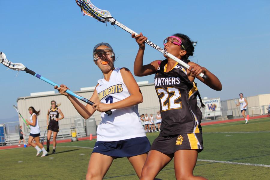 Junior Emma Doyle battles it out with the Panthers on Wednesday, April 1.