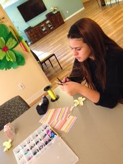 Volunteer Tessa Dubay is helping with building decorations for Easter. (Photos of volunteers working with the senior residents were not allowed).
