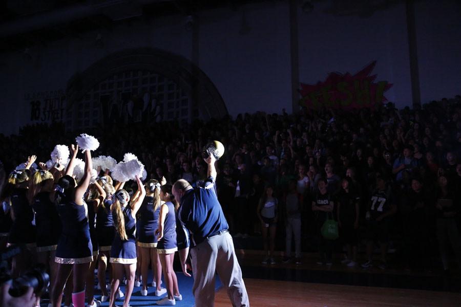Principal Mark Crawford raised the spirit helmet for the students. 