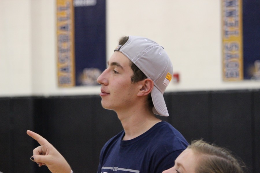 Senior ASB member Sam Hassanzadeh watches over as the final preparations are being made. A lot of hard work has gone into making the rally, and a small amount of satisfaction shows as everything comes into place.  