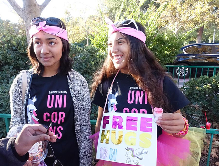 West Ranch seniors Maha Zaman and Siobhan Rubio wait for the park to open.