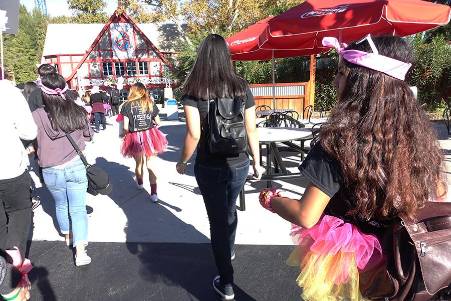 Key Clubbers head to ride Twisted Colossus.