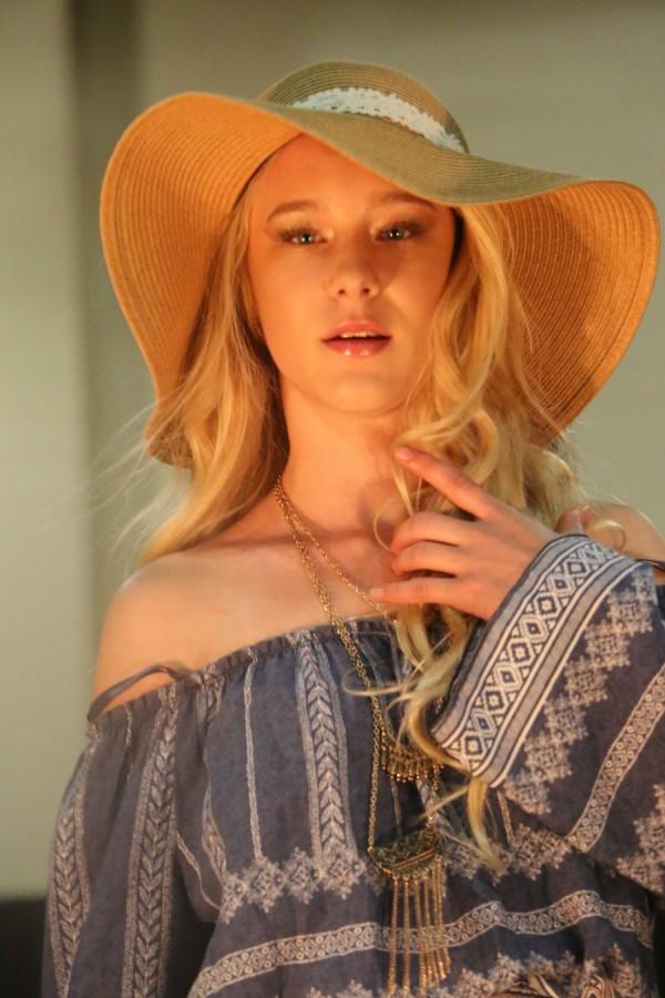 This model is modeling Styles for Less.