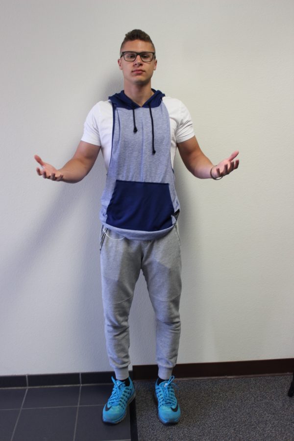 Evan Young reveals his guns.