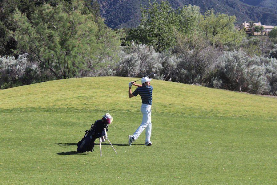Sophomore Drake Walker holds his stroke after a swing. Walker and the other golf members lead the team to a CIF championship.