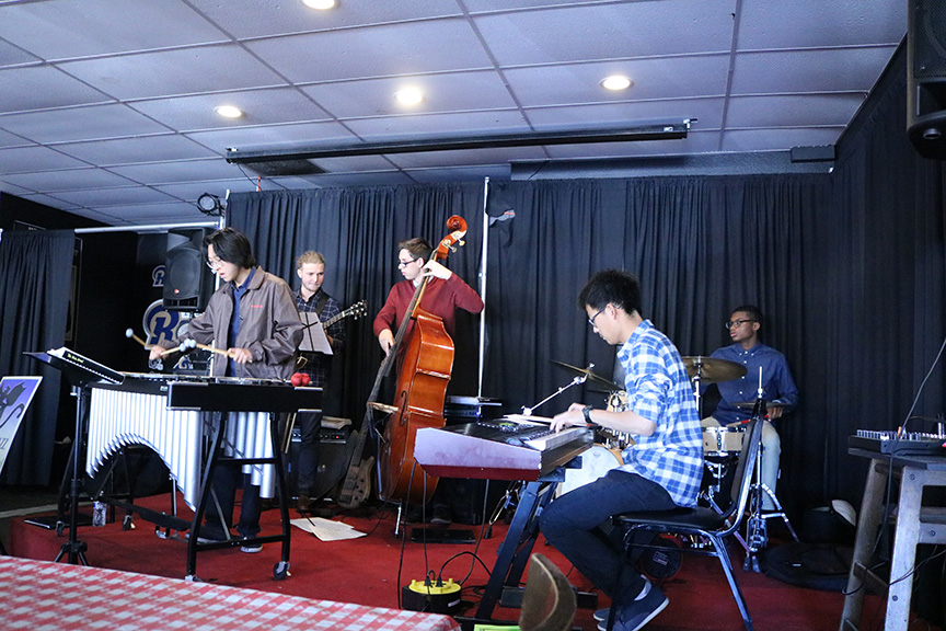 West Ranch Jazz Combo performs on stage at Vincenzos Pizza