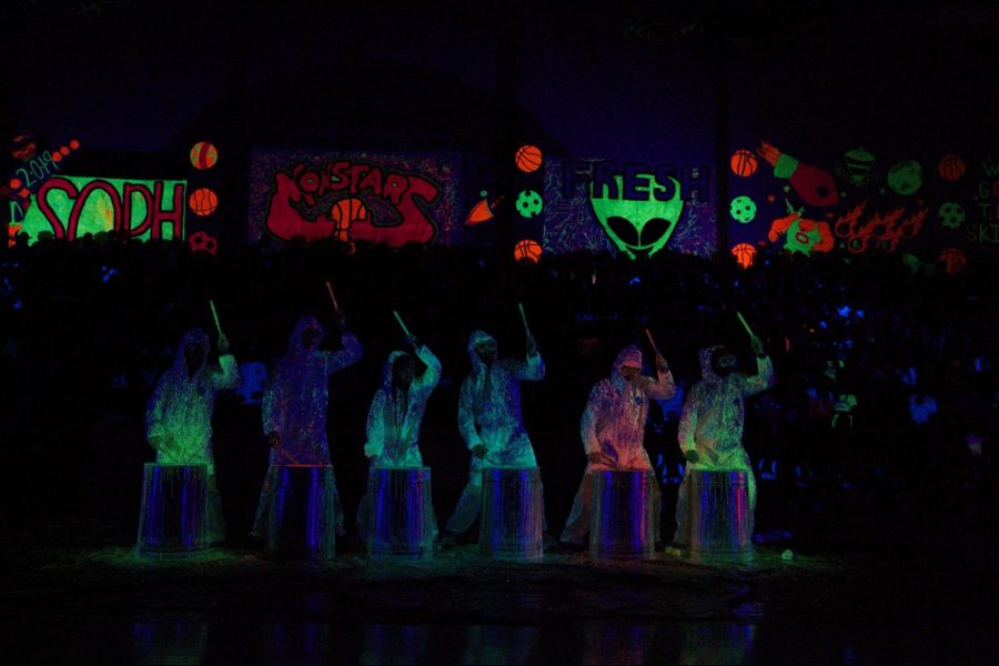 Drumline puts on a neon performance that was as fun to listen to as to watch. Their enthusiastic playing was the highlight of the rally for many students.
