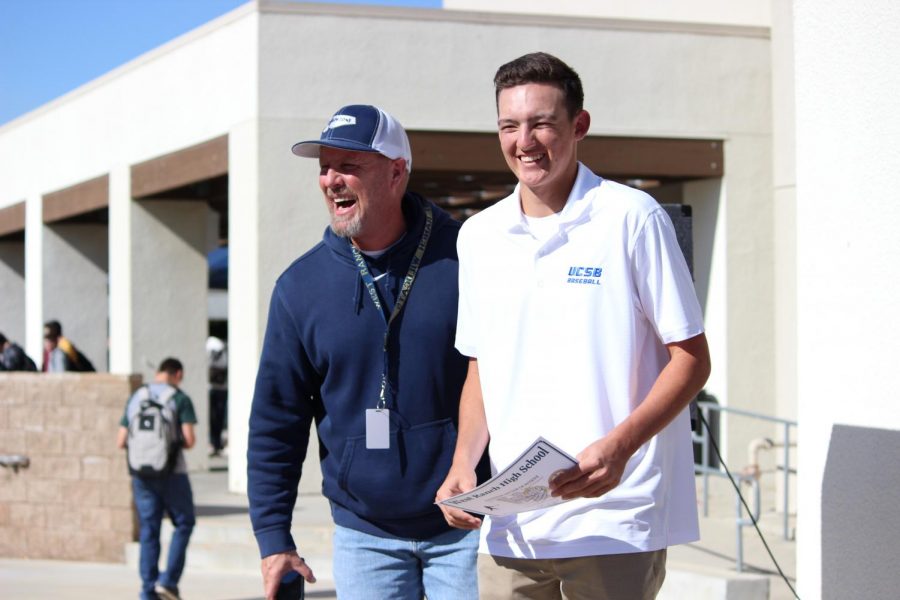 JD Callahan stands with his coach. 