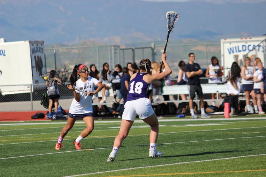 Varsity Girls Lacrosse Team Crushes Vikings in First League Game
