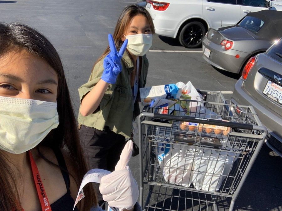Christina Riel and Krysta Mendoza, both juniors at West Ranch. Krysta and I were shopping for an order from Albertsons for two families who ordered through Six Feet Supplies said Riel. Picture provided by Caleb Kim. 