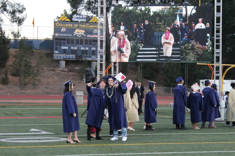 West+Ranch+Class+of+2022+graduates+with+a+turn+of+a+tassel+and+caps+thrown+into+the+air+in+celebration